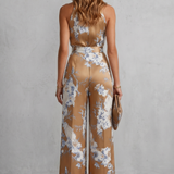 Floral Wide-Leg Jumpsuit with Halter Neck and Pleated Waist