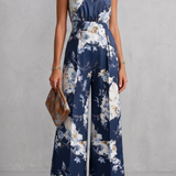 Floral Wide-Leg Jumpsuit with Halter Neck and Pleated Waist