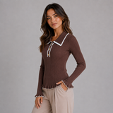 Ribbed Knit Sweater with Contrast Trim and Ruffle Hem
