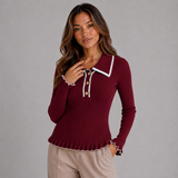 Ribbed Knit Sweater with Contrast Trim and Ruffle Hem