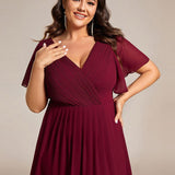 Pleated Wrap Midi Dress with Flutter Sleeves and Asymmetric Hem