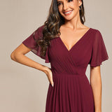 Pleated Wrap Midi Dress with Flutter Sleeves and Asymmetric Hem