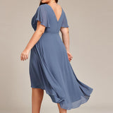 Pleated Wrap Midi Dress with Flutter Sleeves and Asymmetric Hem