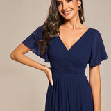 Pleated Wrap Midi Dress with Flutter Sleeves and Asymmetric Hem