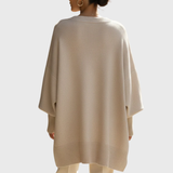 Oversized Poncho Sweater with Asymmetric Hem