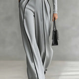 Wide-Leg Jumpsuit with Turtleneck and Belted Waist