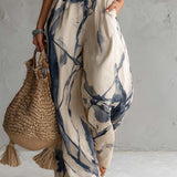 Wide-Leg Jumpsuit with Halter Neck and Cut-Out