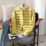 Quilted Puffer Jacket with Snap Button and Round Neck