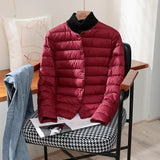 Quilted Puffer Jacket with Snap Button and Round Neck