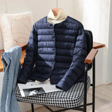 Quilted Puffer Jacket with Snap Button and Round Neck
