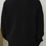 Oversized Knit Sweater with Ribbed Hem and Long Sleeves