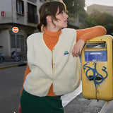 Women's Fleece Vest with Button Front Sleeveless Design and Textured Teddy Finish for Fall