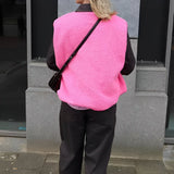 Women's Fleece Vest with Button Front Sleeveless Design and Textured Teddy Finish for Fall